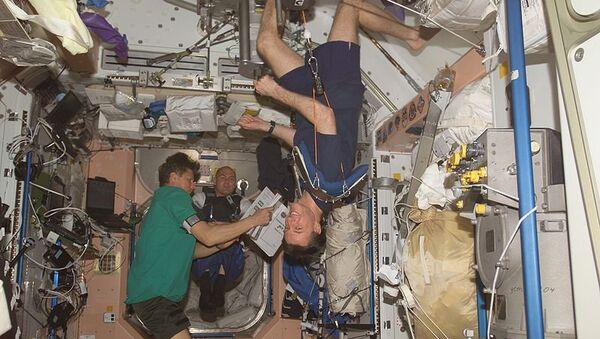 Космонавты на борту Международной космической станции. Архив