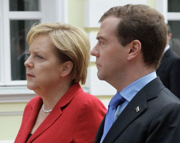 Президент РФ Дмитрий Медведев с канцлером ФРГ Ангелой Меркель. Архив