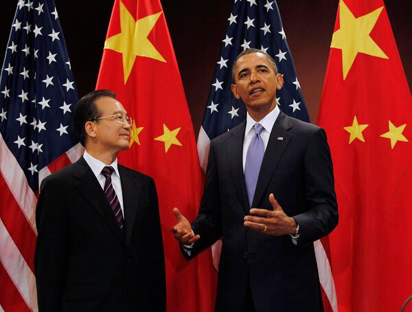 Обама призвал Китай разрешить спор о курсе юаня