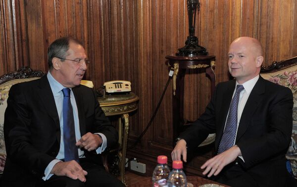 Министр иностранных дел России Сергей Лавров и министр иностранных дел Великобритании Уильям Хейг (слева направо). Архив