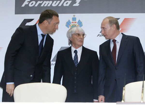 Олег Дерипаска, Бернард Экклстоун и Владимир Путин (слева направо)