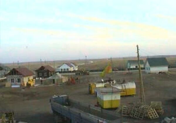 Стоп-кадр он-лайн трансляции строительства домов в поселке Николаевка Алтайского края