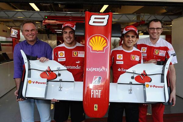Евгений Касперский; пилоты команды Ferrari Формулы-1 Фернандо Алонсо и Фелипе Масса; Стефано Доменикали, руководитель команды Ferrari Формулы-1.