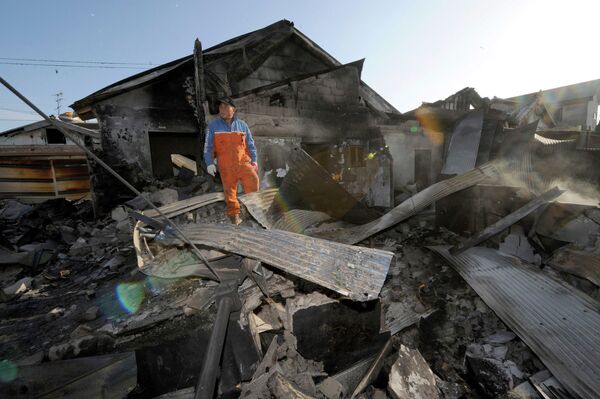 Разрушенные дома на острове Йонпхёндо после нападения КНДР на Южную Корею