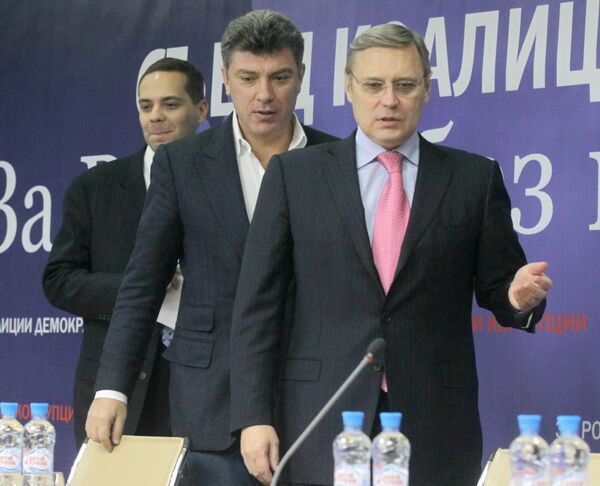 Михаил Касьянов, Борис Немцов, Владимир Милов (справа налево). Архив