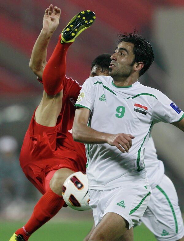 Игровой момент матча Ирак - КНДР