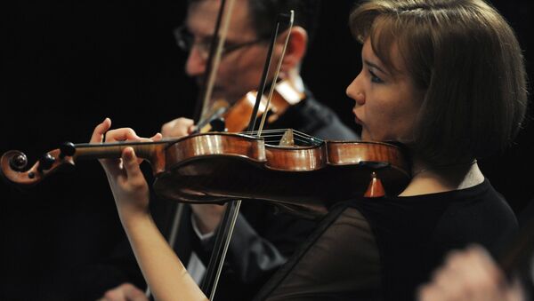Музыканты Большого симфонического оркестра во время концерта. Архивное фото