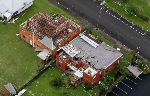 Разрушенные в результате циклона Яси дома в Австралии