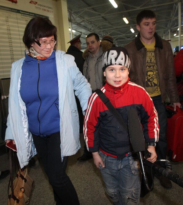 Встреча российских граждан, эвакуированных из Ливии в аэропорту Домодедово. Архив
