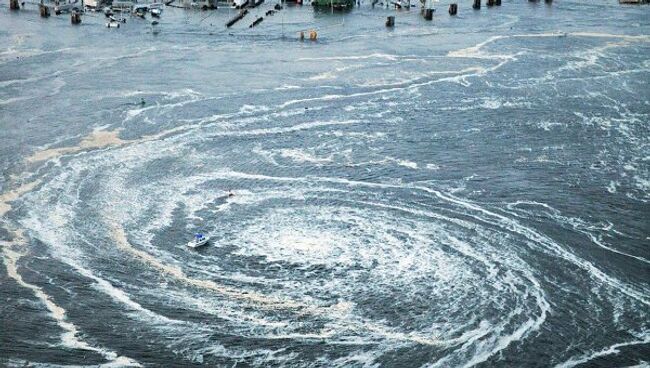 Последствия землетрясения и цунами в японском городе Оарай