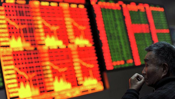 Электронное табло фондовой биржи в Шанхае