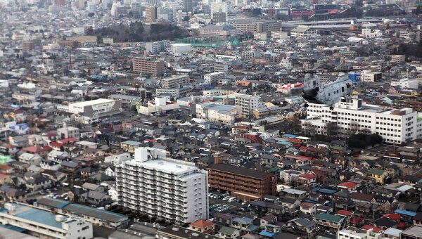 Вид на пострадавший в релуьтате землетрясения город Сендай, префектура Мияги (14 марта 2011)