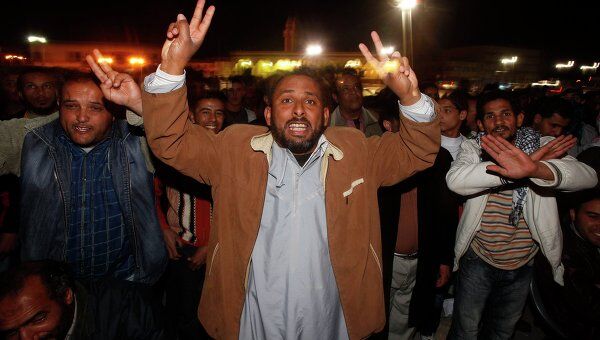 Жители Тобрук вышли на улицы после начала военных действий против сил ливийского лидера Муаммара Каддафи