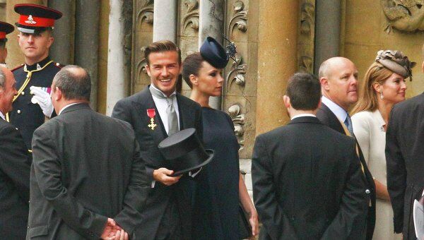 Дэвид Бекхэм с женой Викторией на свадьбе принца Уильяма и Кейт