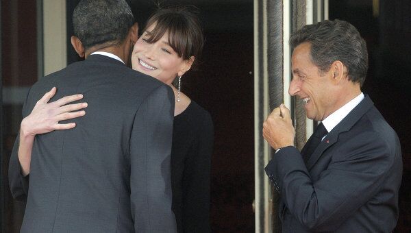 Президент Франции Николя Саркози с супругой Карлой Бруни и президент США Барак Обама. Архив