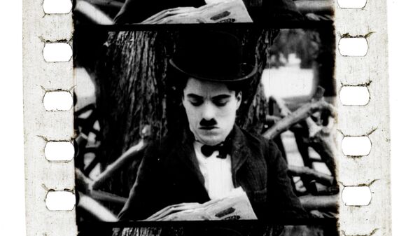 Кадр из фильма с Чарли Чаплином