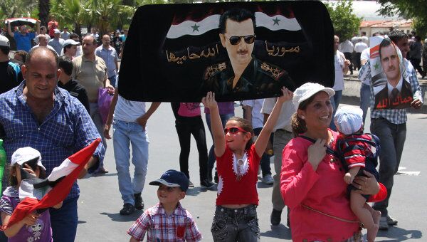 Массовые демонстрации в поддержку режима Асада в Дамаске