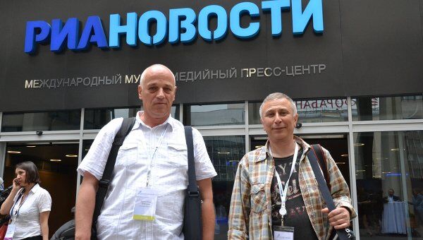 Франк Книспель и Игорь Магрилов (слева направо) стали гостями РИА Новости в Москве 23-25 июня 2011 года.