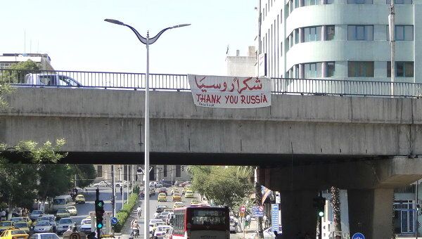 Плакат в центре Дамаска с надписью:  Спасибо России