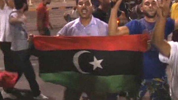 Аплодисментами и стрельбой в воздух встретили повстанцев жители Триполи