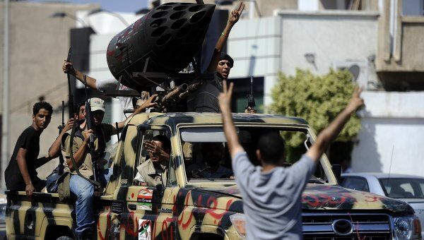 Ожесточенные бои идут у резиденции Каддафи в Триполи - Аль-Арабия