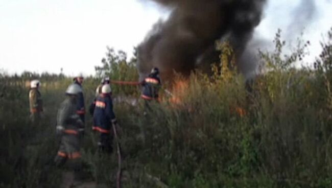 Старые покрышки загорелись на территории ГСК в Дзержинском