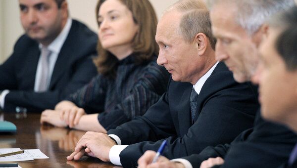 Премьер-министр РФ Владимир Путин проводит встречу с Йoзефом Акерманном