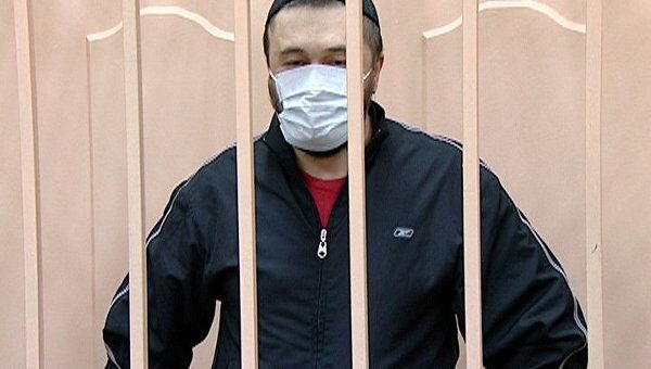 Обвиняемый в убийстве Анны Политковской появился в зале суда в маске