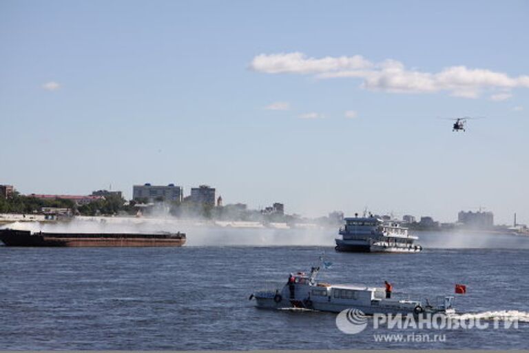 Спасатели КНР и Приамурья провели на Амуре масштабные учения вода-воздух