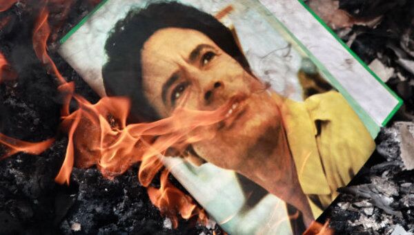 Каддафи, его сын и экс-глава разведки Ливии объявлены в международный розыск