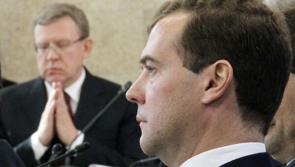 Президент России Дмитрий Медведев и министр финансов России Алексей Кудрин. Архив