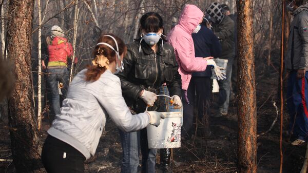 Участие добровольцев в тушении пожаров в лесной зоне