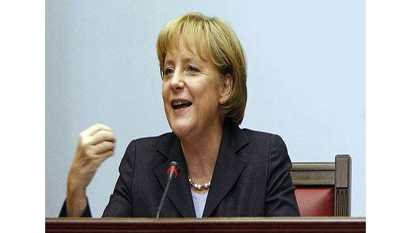 Меркель приветствует переход Opel под контроль Magna