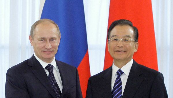 Премьер-министр РФ Владимир Путин принимает участие в российско-китайских переговорах