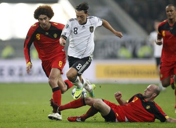 Игровой момент матча Германия - Бельгия