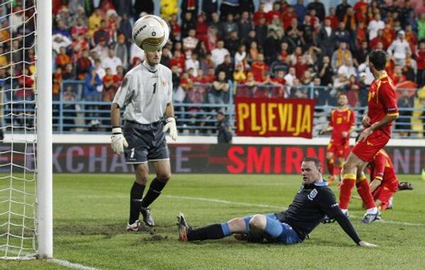 Игровой момент матча Черногория - Англия