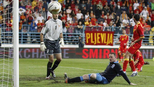 Игровой момент матча Черногория - Англия