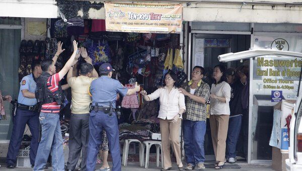 Ограбление отделения банка Masuwerte Rural Bank в городе Бакур (Bacoor) на Филиппинах