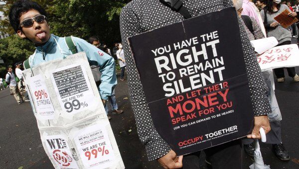 Жители Японии вышли на улицы в поддержку акций против финансового терроризма