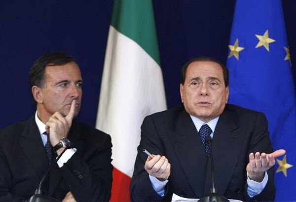 Франко Фраттини и Сильвио Берлускони на саммите в Брюсселе