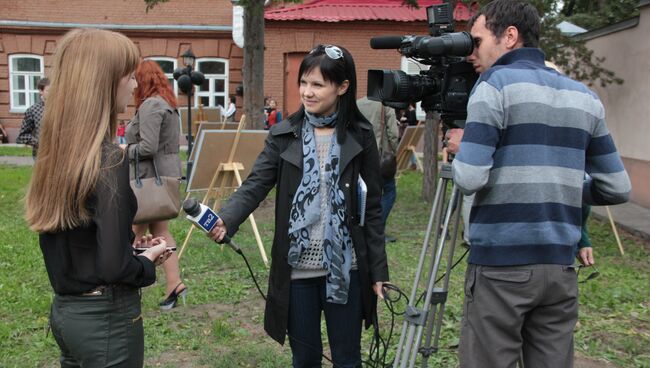 работа журналистов на выставке 