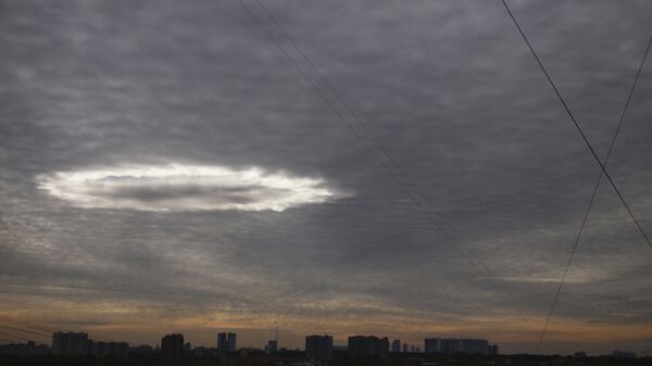 Светящаяся воронка над Москвой