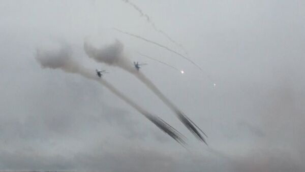 Су-24 и Ми-24 ведут обстрел противника из систем залпового огня Град