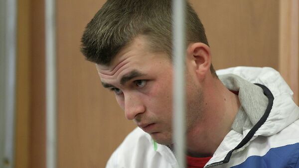 Подозреваемый в двойном убийстве Илья Комаров в зале суда