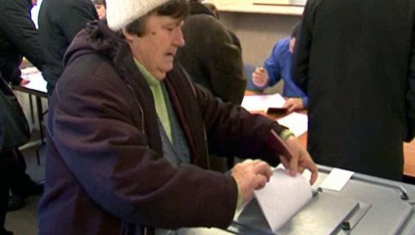 Россияне в Цхинвали и Минске голосуют на выборах в Госдуму