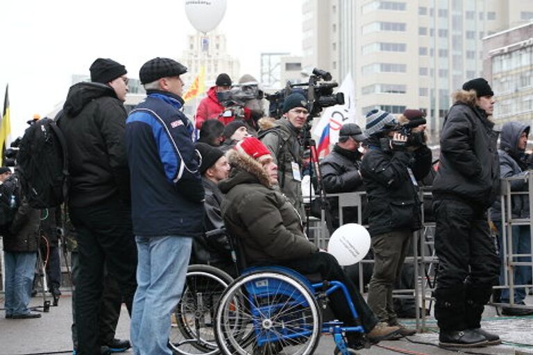 Митинг в Москве репортер