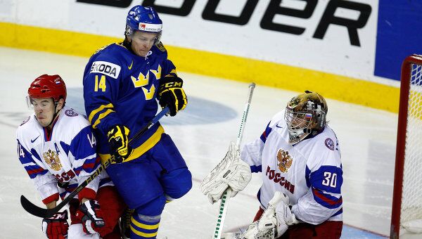 Игровой момент матча Россия - Швеция 