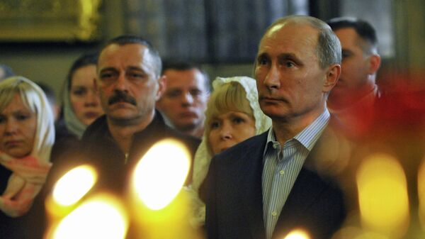 Премьер-министр РФ В.Путин на Рождественском богослужении в Санкт-Петербурге