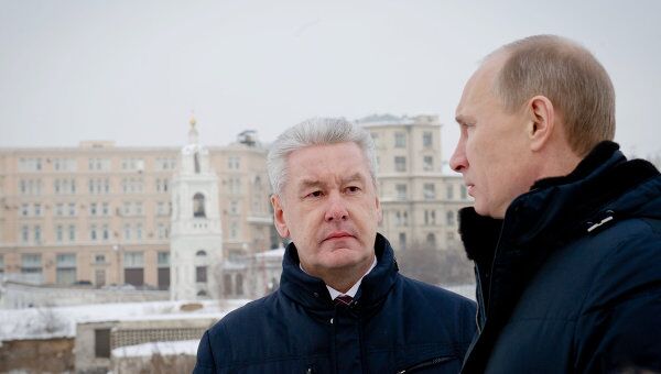 В.Путин и С.Собянин посещают место бывшей гостиницы Россия
