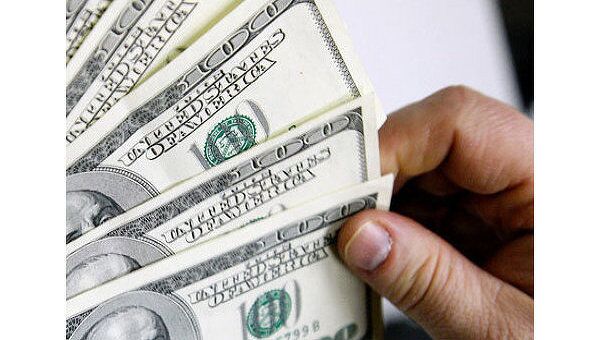 Курс доллара вырос на открытии в понедельник на 7 коп - до 28,38 руб
